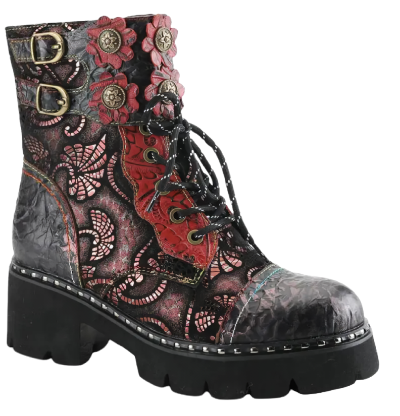 A pair of boots with floral designs on them.